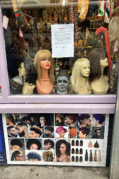 Wigs at window shop at Parnell Street, Dublin